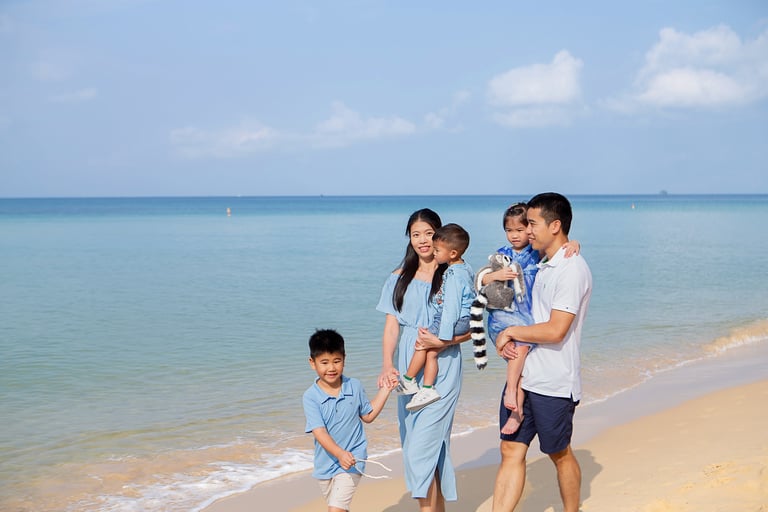 Family beach photoshoot near Sailing Club Phu Quoc shoreline