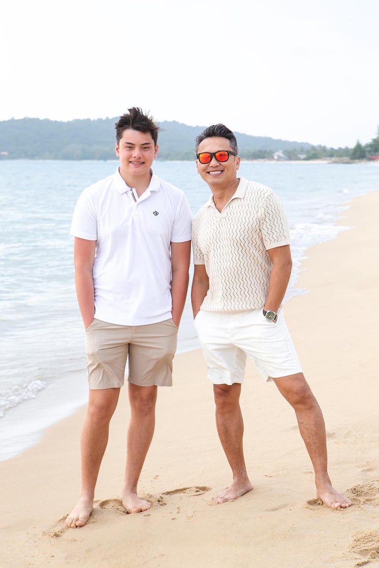 Father and son portrait on Vinpearl beach in Phu Quoc