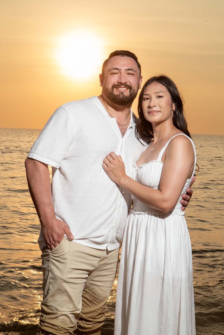 Couple hugging at sunset on Long Beach Phu Quoc