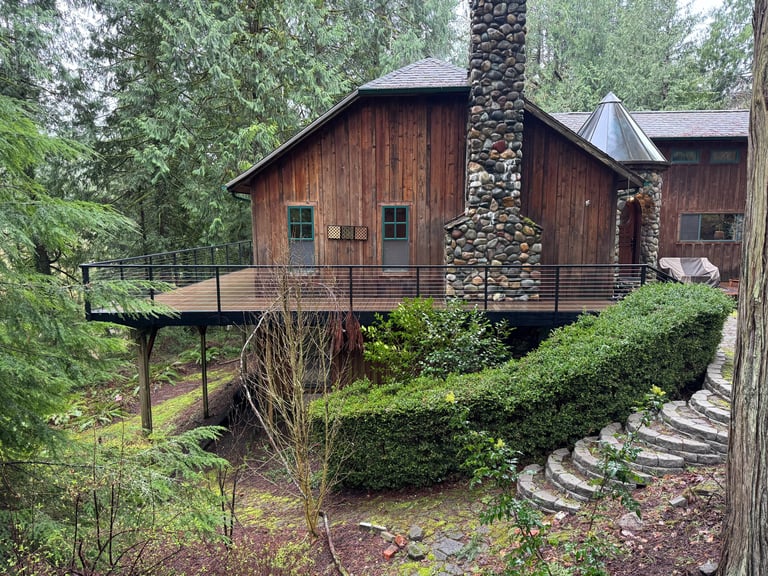 Custom deck and railing completed by Hill Family Homes