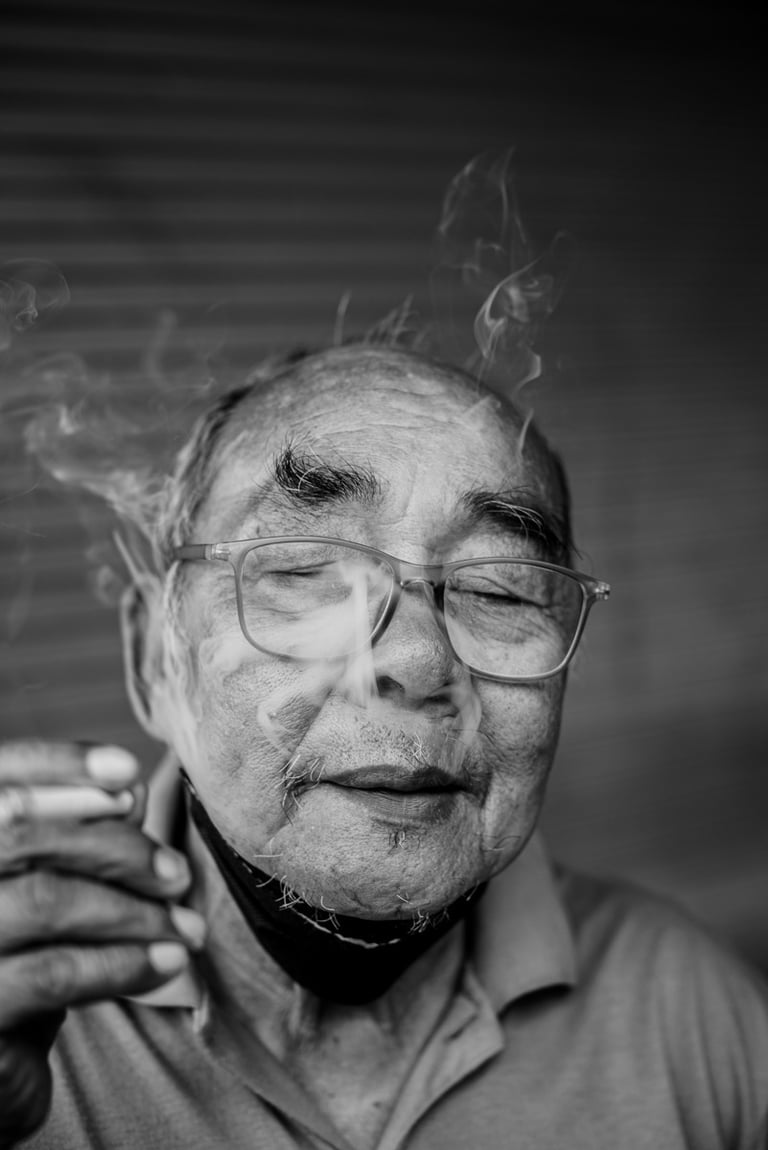 Thai man smoking tobacco