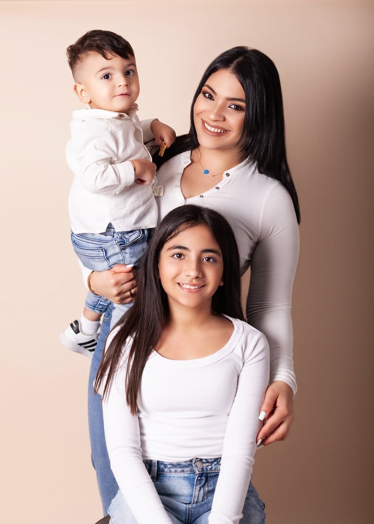 Fine art family portrait session in Sydney studio featuring mother and children