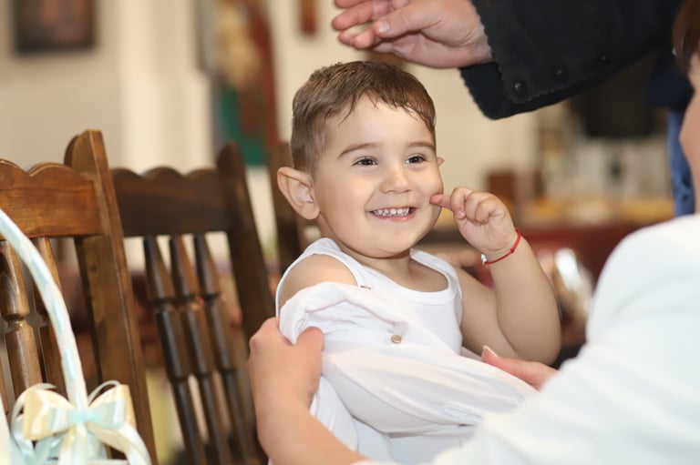 Кръщене на дете заснето от Фотограф Светлана Велинова в град Перник