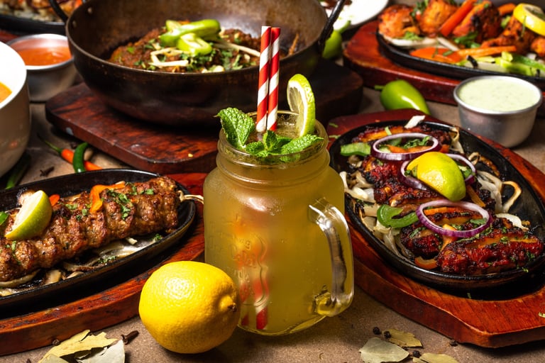 Fresh mocktail with dishes around it