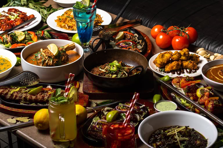 Table with lots of pakistani foods