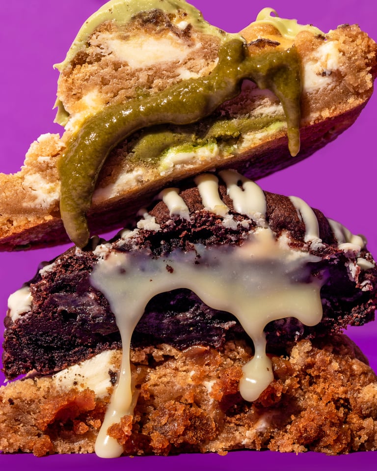 Gooey sauce dripping off a stack of cookies.