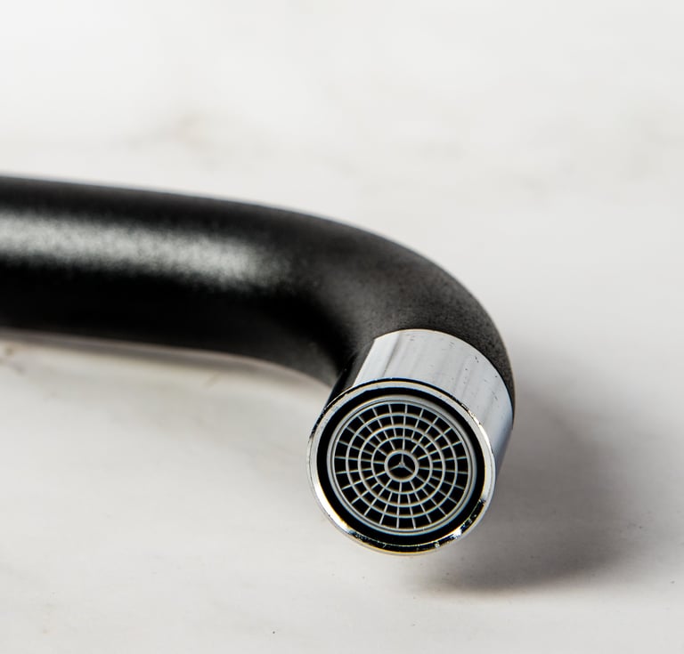 Close up of the head of a bathroom tap