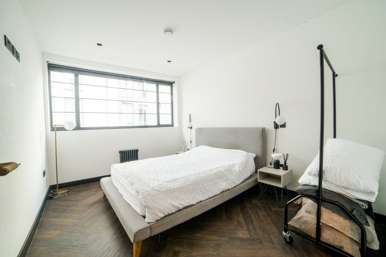 Full view of a bedroom showing light and space