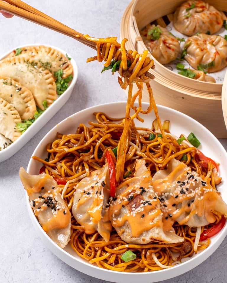Noodle dumpling bowl with chopsticks