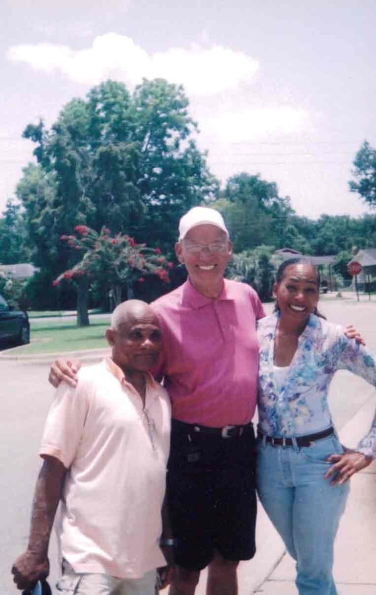 Par Four Golf Club image of three golfers posing for the camera