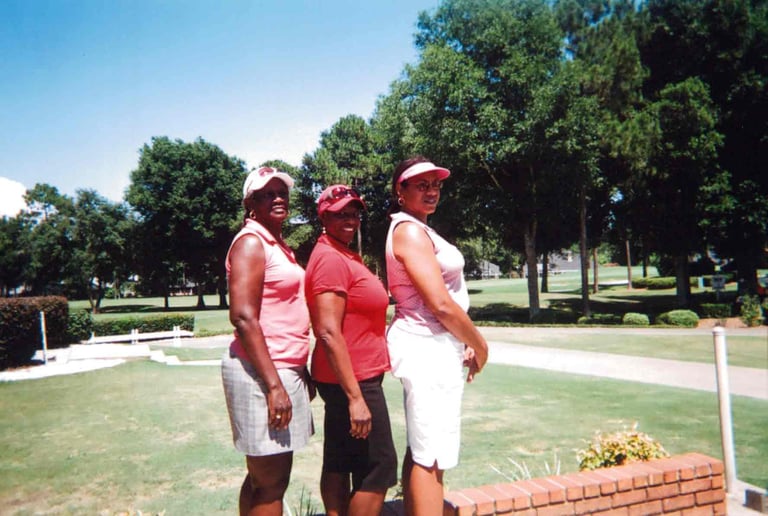 Par Four Golf Club image of three black women golfers posing