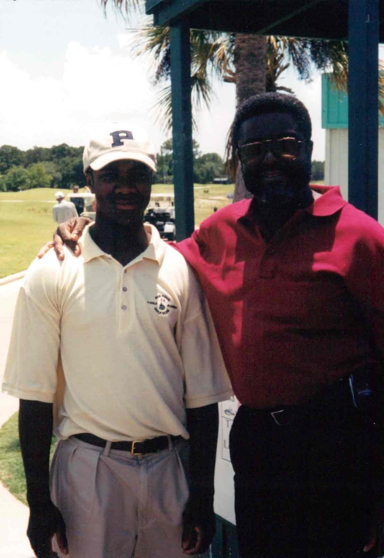 Par Four Golf Club image of black father and son