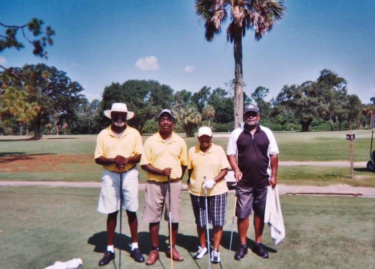 Par Four Golf Club image of four black golfers posing