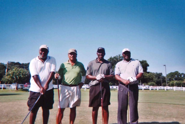 Par Four Golf Club image of four black golfers posing with clubs
