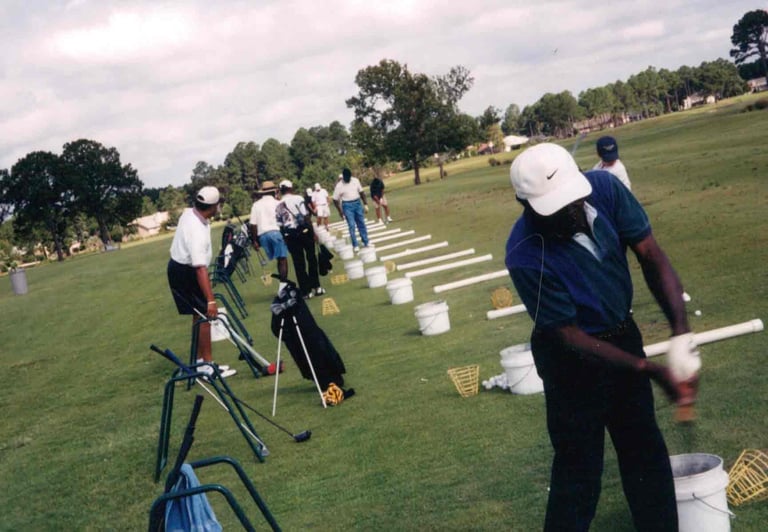 Par Four Golf Club image of group of black golfers teeing up 