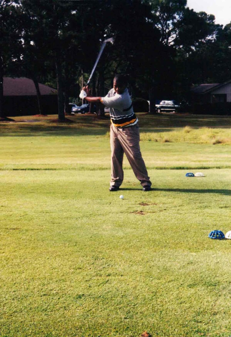 Par Four Golf Club image of young black golfer