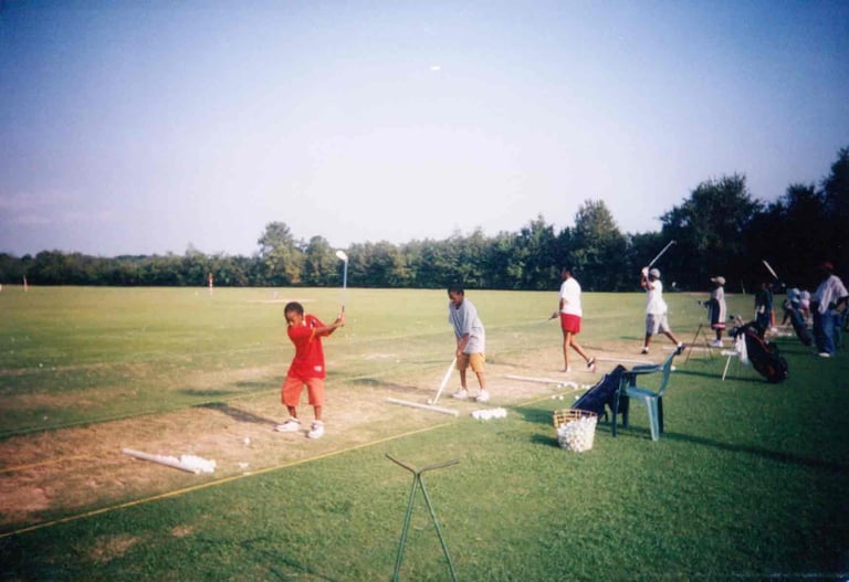 Par Four Golf Club image of young black golfers practicing
