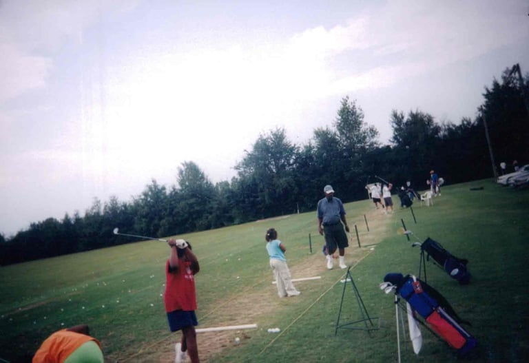 Par Four Golf Club image of young black golfers practicing