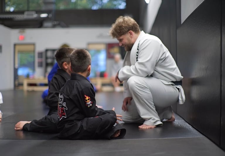 BJJ Coach Talking to Students