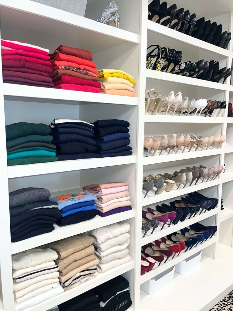 Organized clothes in walk-in closet near Fort Worth