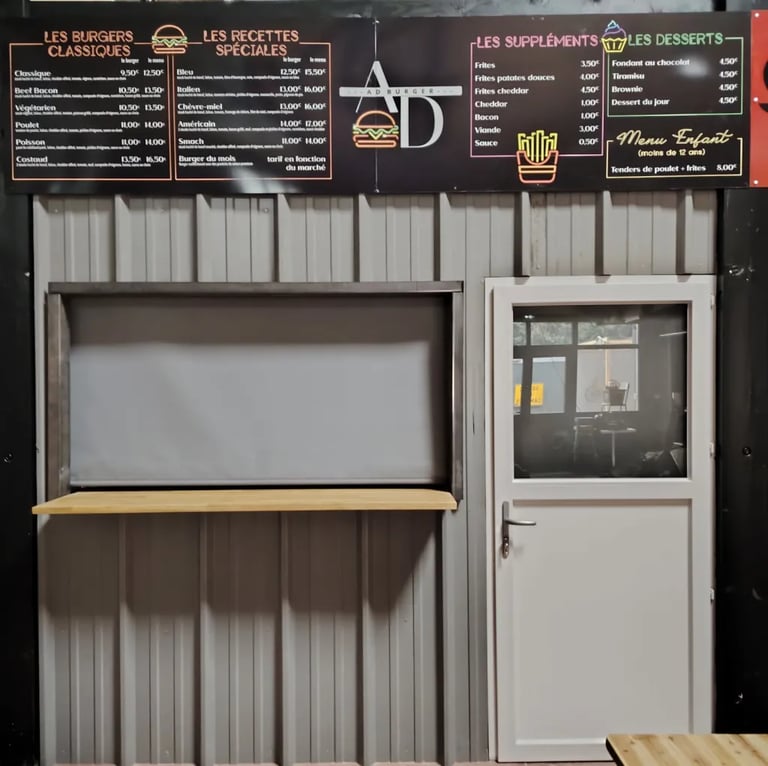 Bannière du food court AD Burger : burgers gourmands et ambiance rétro 50s à L’Entrepotes Conceptsto