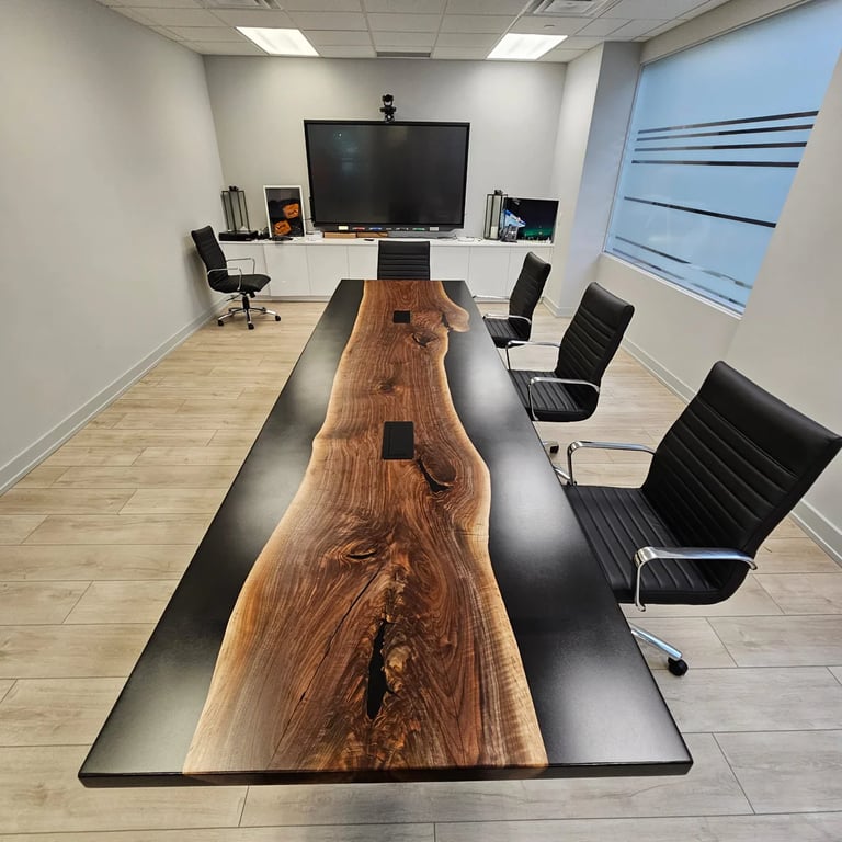 Custom black walnut epoxy boardroom table — top surface and grain detail