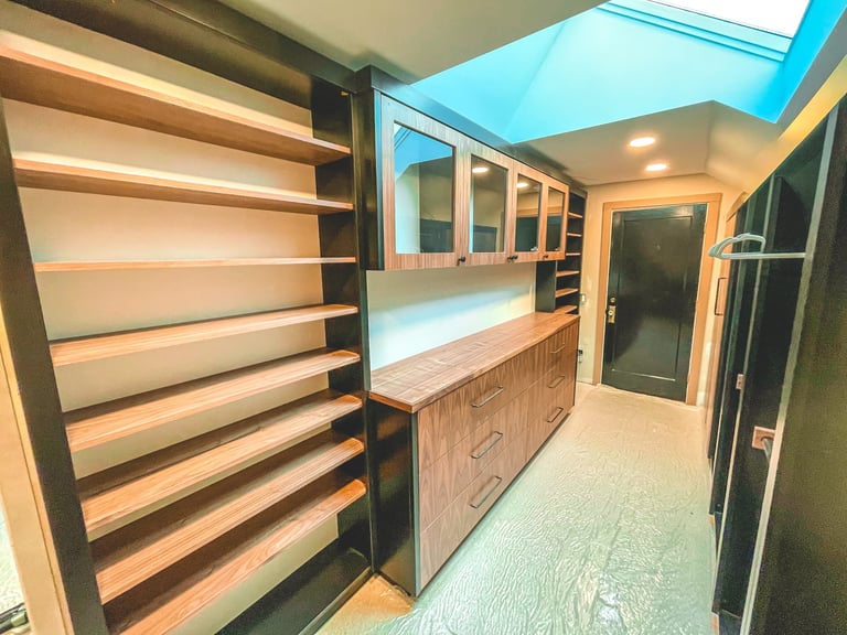 High end custom luxury closet designed and built for a Pearce Woodworks Detroit client.
