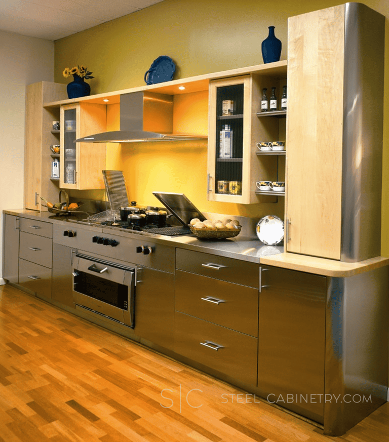 Stainless steel cabinets integrated with warm materials