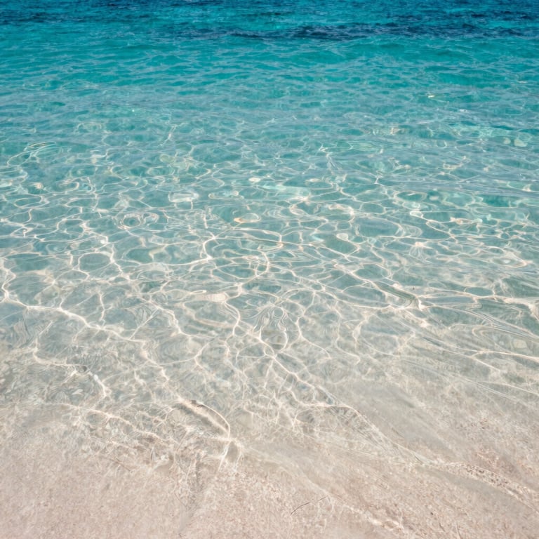 A clear-water seaside on Sithonia with Sail boat Christina