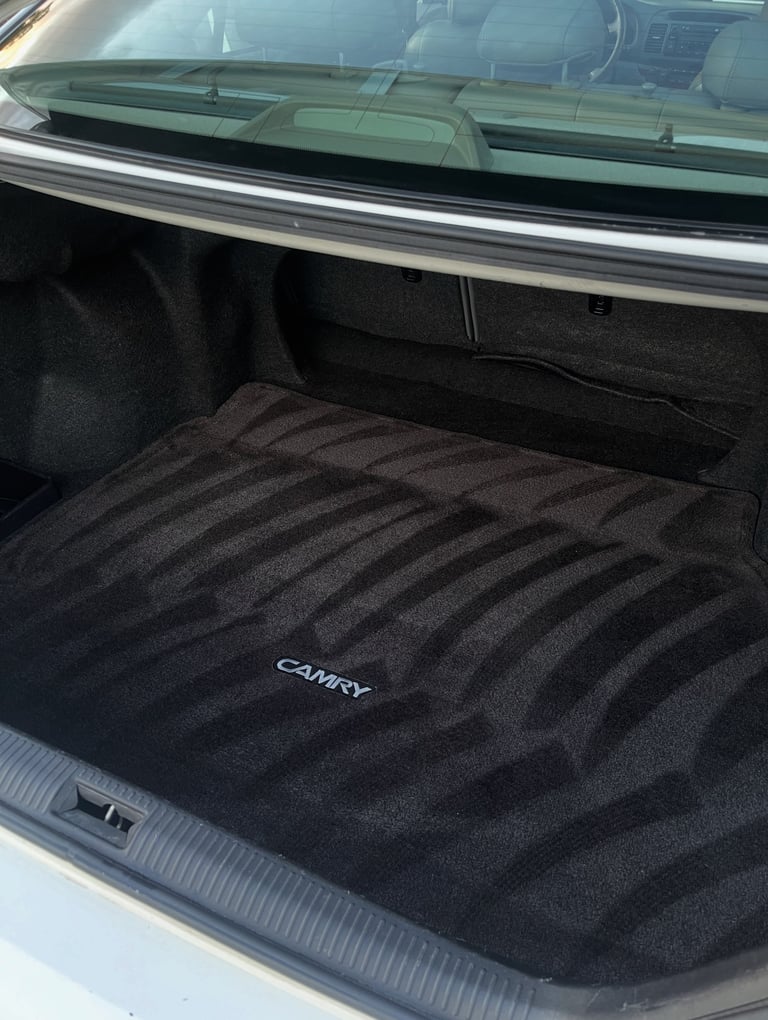 Fresh carpet lines after interior detailing in Logan Ohio showing clean vehicle flooring