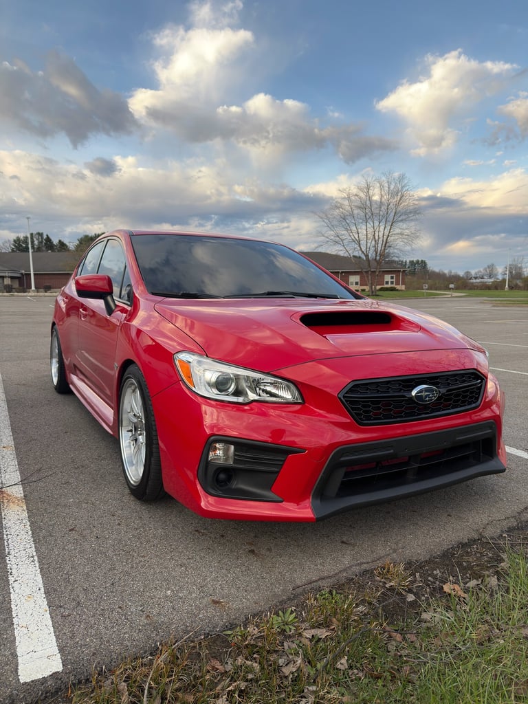 Ceramic coating service in Logan Ohio protecting car paint with high gloss finish