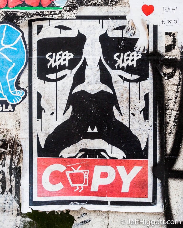 Urban street art poster featuring Dacface and Sleep is famous with Copy text on a grimy wall.