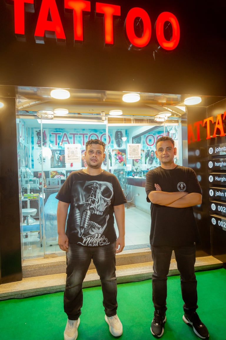  “Team photo at Hurghada Tattoo studio”Hurghada tattoo artist John & George – professional headshot”