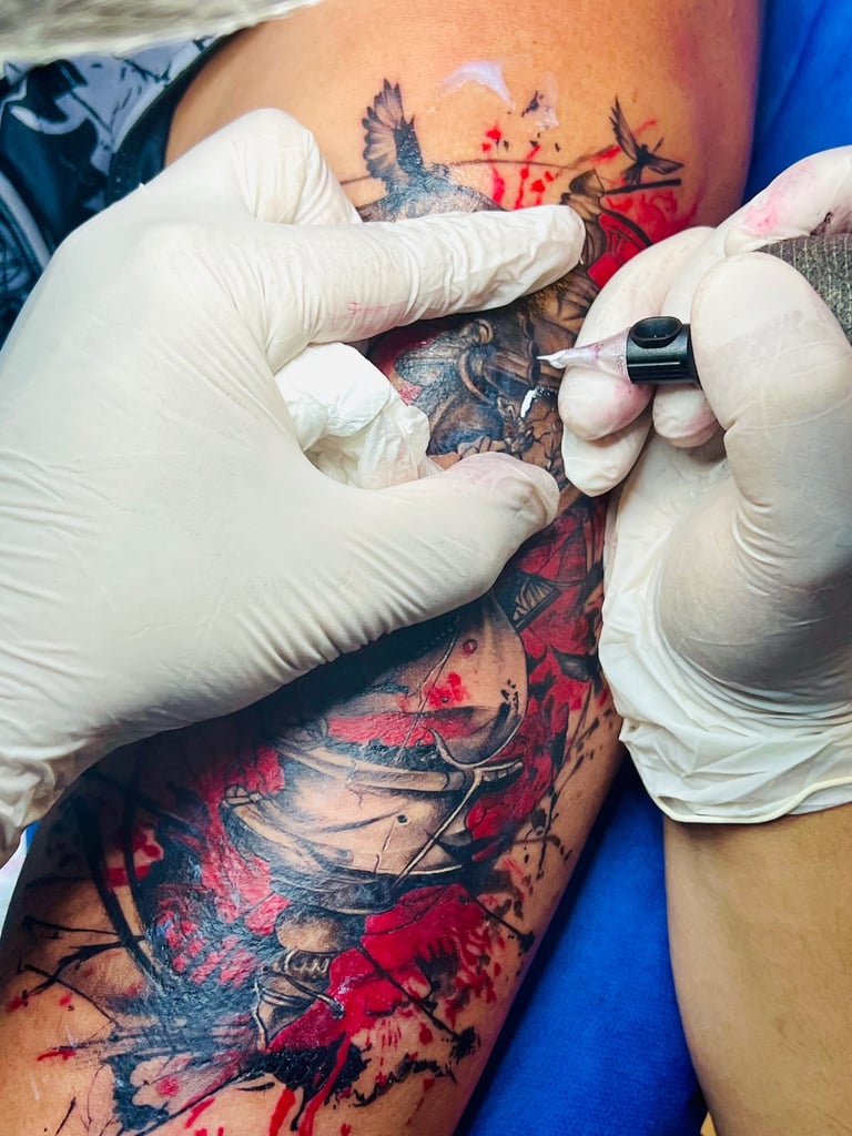 Tattoo artist in Hurghada doing fine line tattoo on client’s arm”