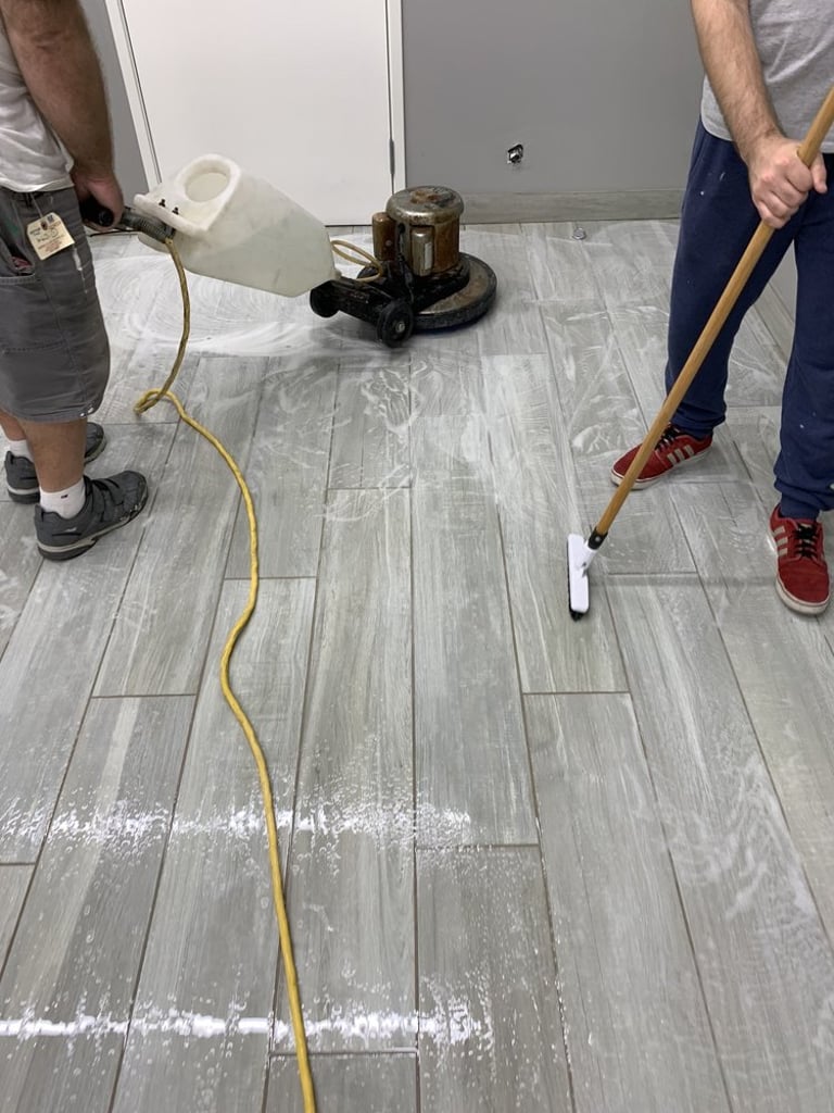 Surgical clinic floor being deep cleaned and scrubbed