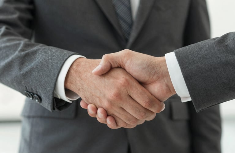 A high-quality, close-up shot of a firm handshake between two individuals in professional attire, signifying a pact of trust and integrity. The lighting is warm and steady, with a color palette focusing on deep greys (#262626) and neutral off-whites (#F2F4F3), conveying solid commitment.