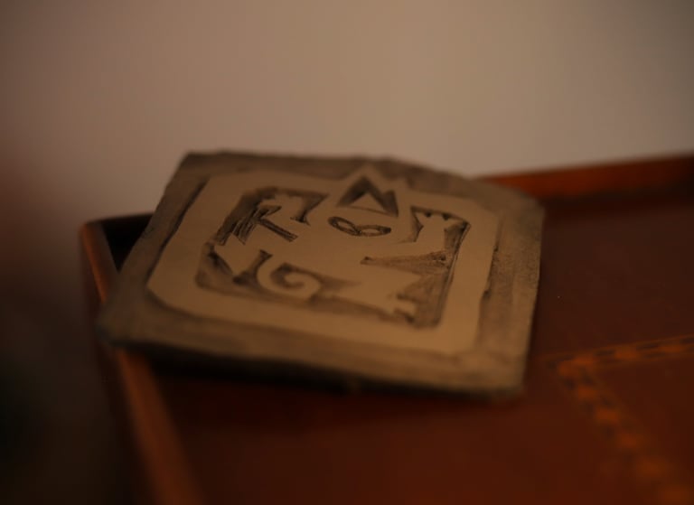 Tampon représentant le logo des éditions du Singe brûlé