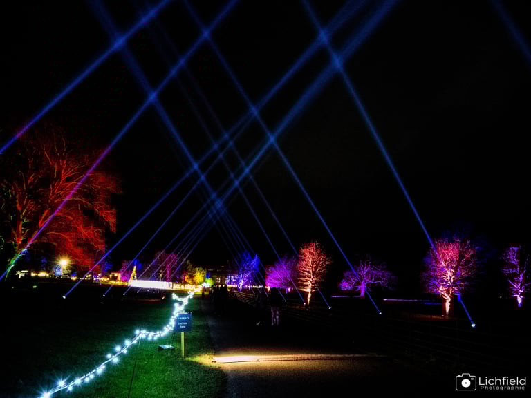 Luminate Lights criss crossing a path