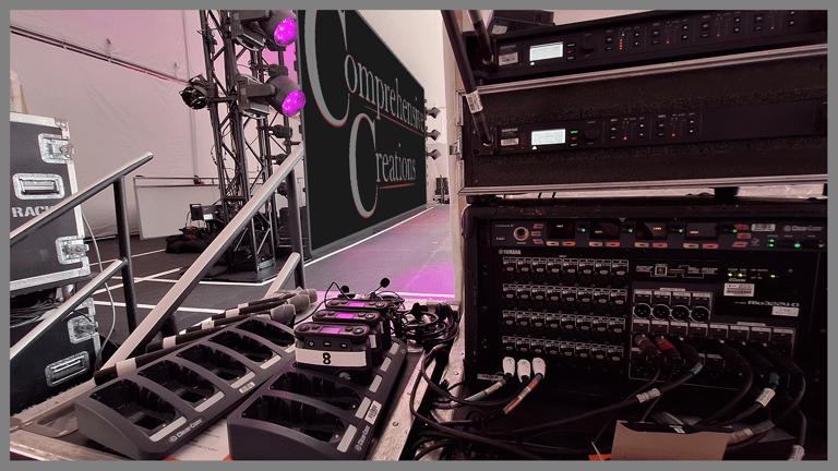 Backstage at live outdoor concert with CC Logo - Event produced by Comprehensive Creations team.