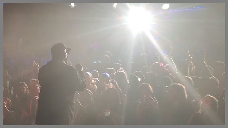Wide shot of BB performing at outdoor event. Produced by Comprehensive Creations team.