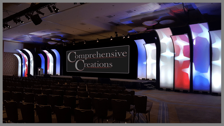 "Stars and Stripes" set with CC logo on screen. Event designed and produced by Comprehensive Creations team.