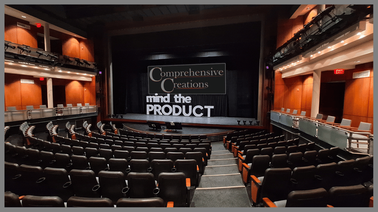 "Mind the Product" theater set with CC logo on 3:1 screen. Event produced by Comprehensive Creations team.