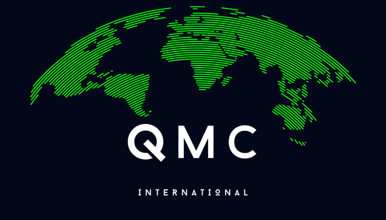 QMC INTERNATIONAL logo