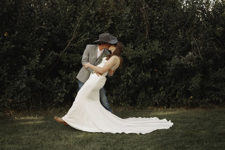 bride and groom portrait, kiss and dip