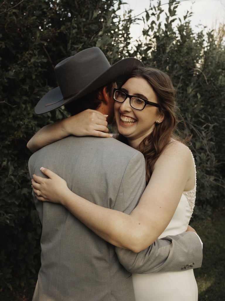 bride and groom portrait, hugging