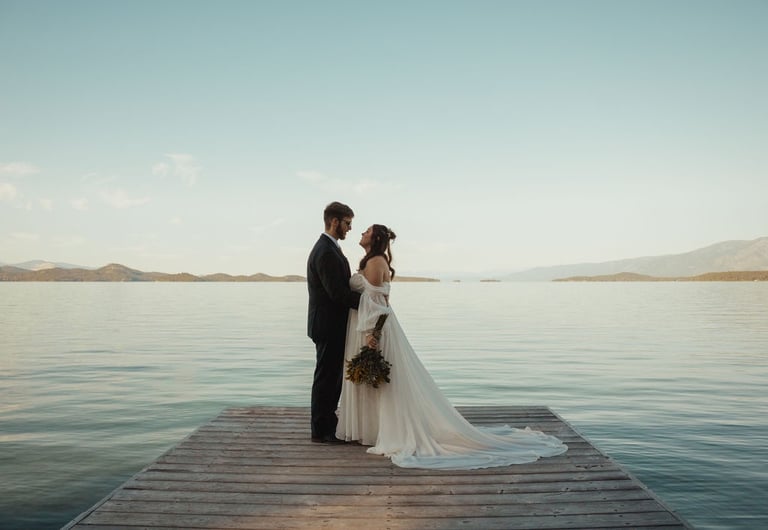 bride and groom portrait on a dock on Flathead Lake, MT