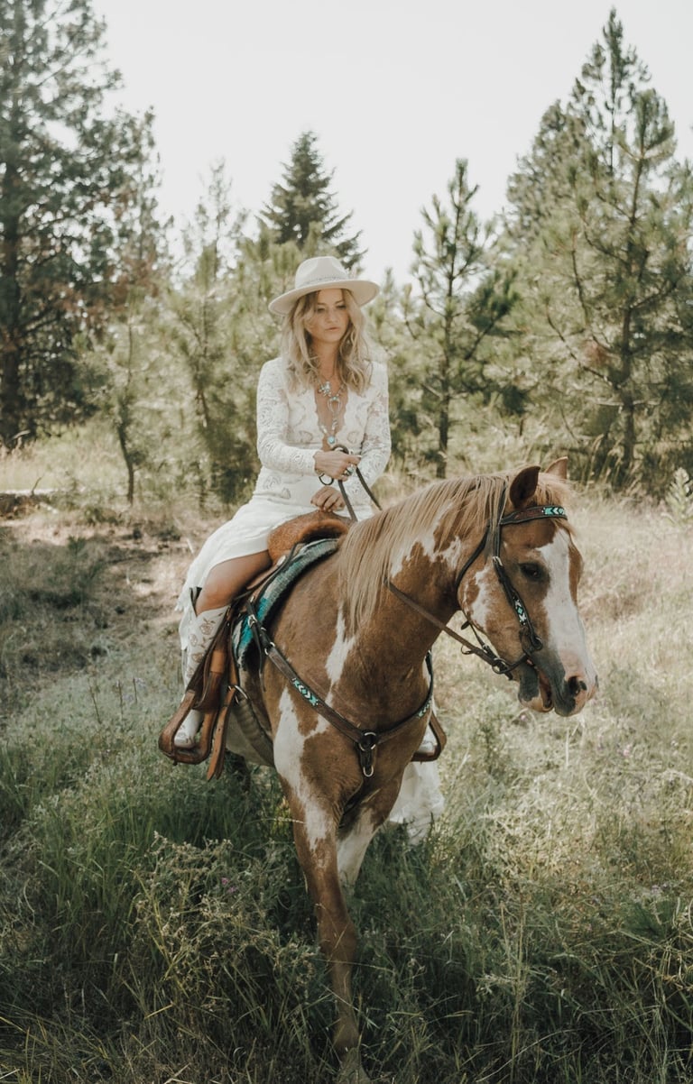 bridal portrait, riding a paint horse, Big Arm State Park