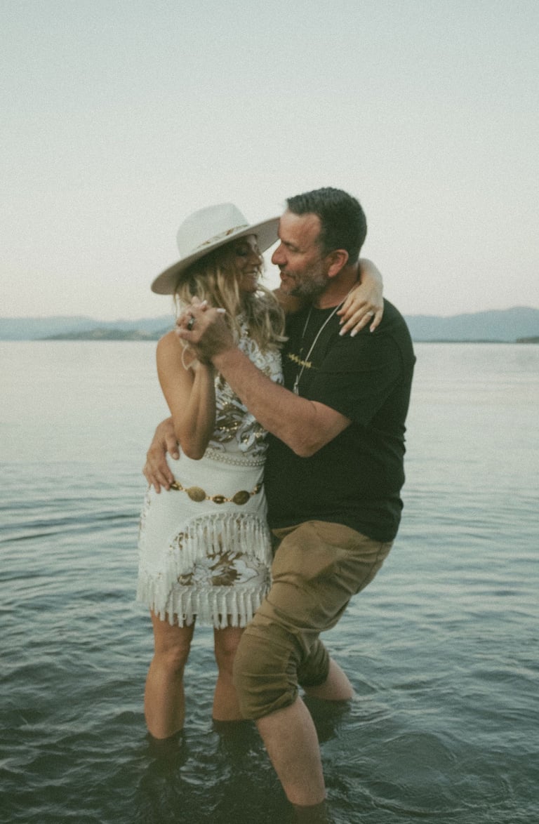bride and groom portrait, dancing in Flathead Lake