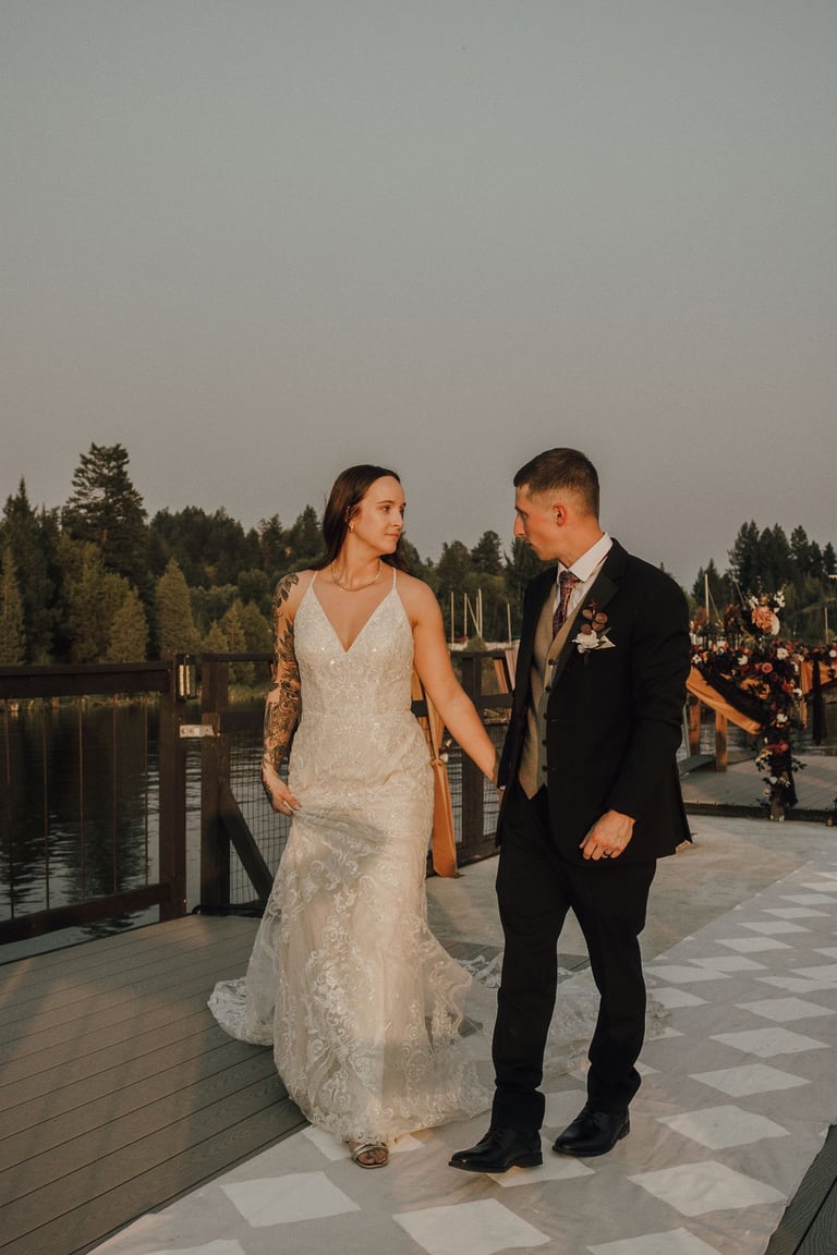 bride and groom walking back down the aisle, house boat
