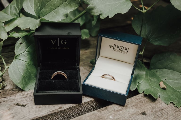 wedding band details, green leaves, wedding boxes